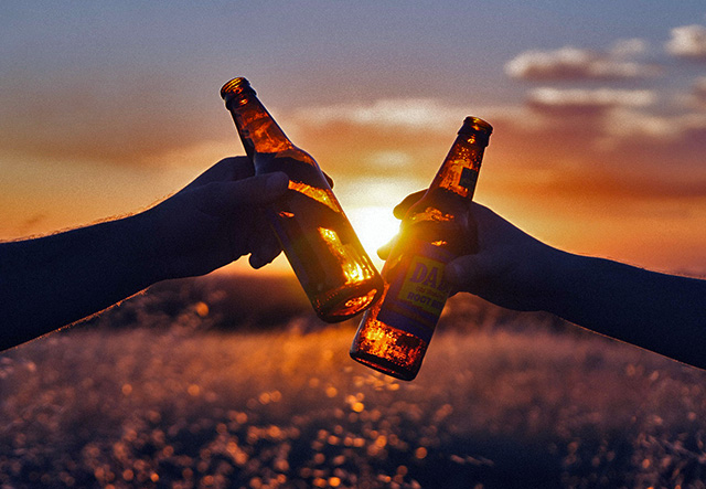 having a beer at sunset