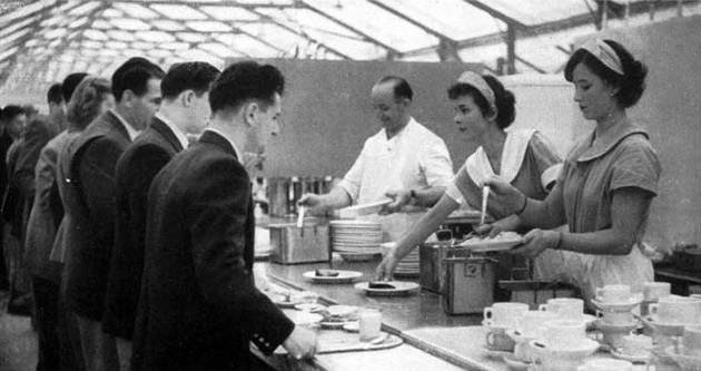 Athletes enjoying a meal at the Olympic Village food hall