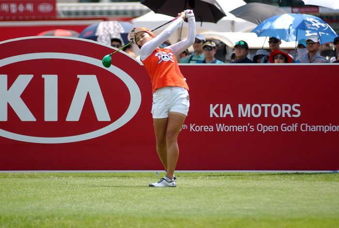 women can match the men close to the green