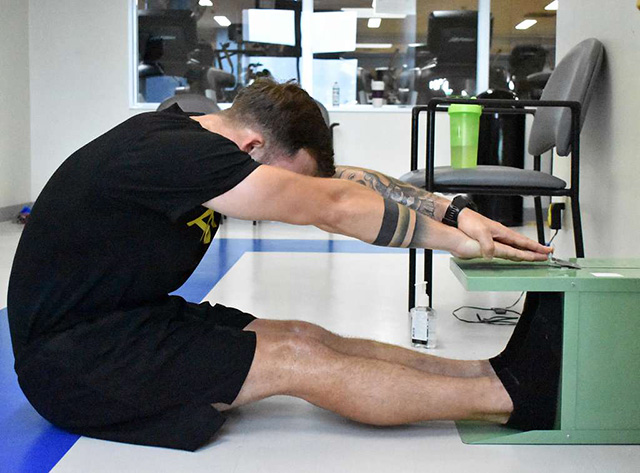 sit and reach test demonstration showing proper form